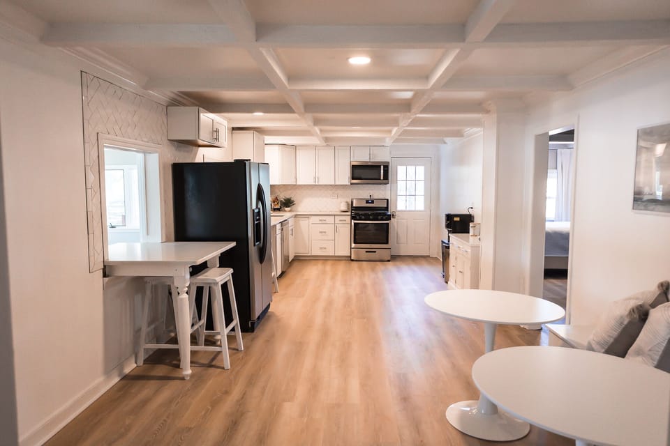 2 pass through bar tops leading into main sunroom creating one cohesive feel!