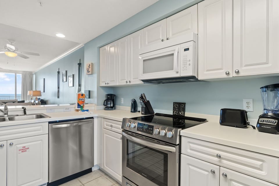 Spacious Kitchen includes all amenities to prepare and enjoy meals together. 