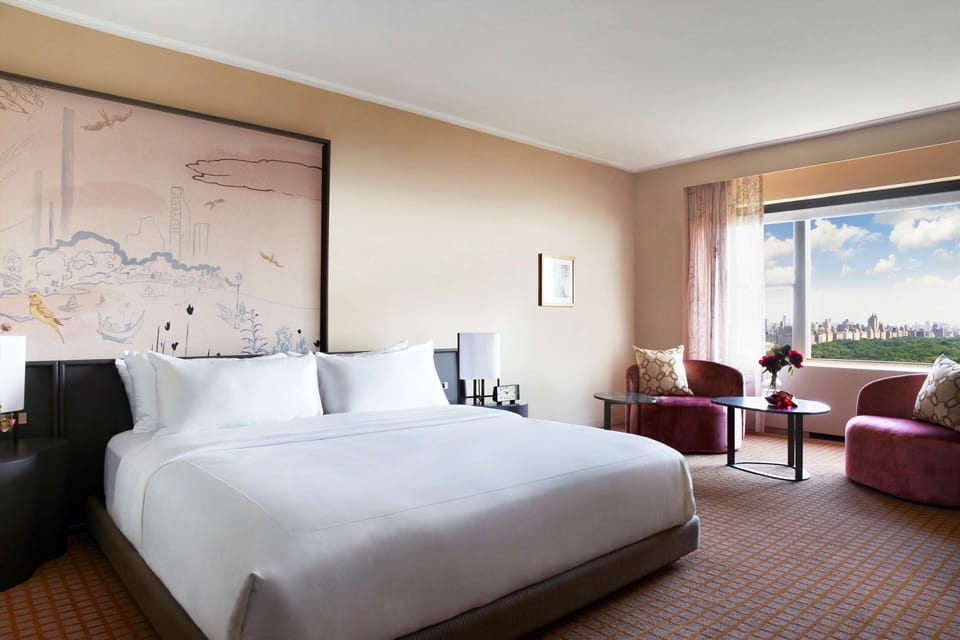 Sink into crisp linens and gaze out over the city.