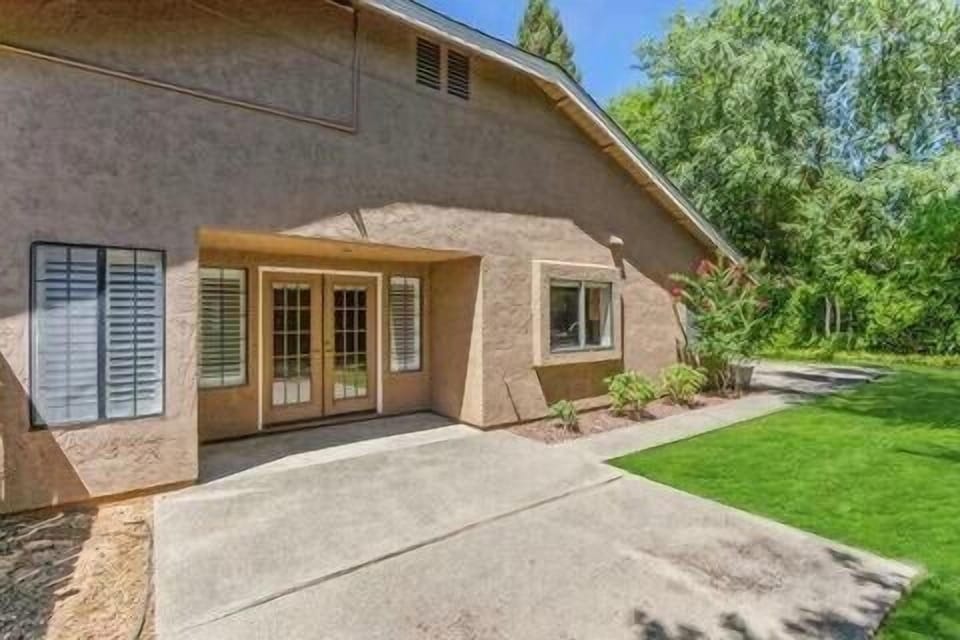 French doors open into the backyard 