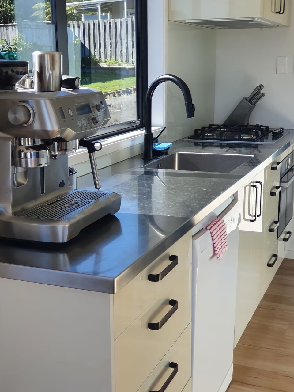 Kitchen with coffee machine