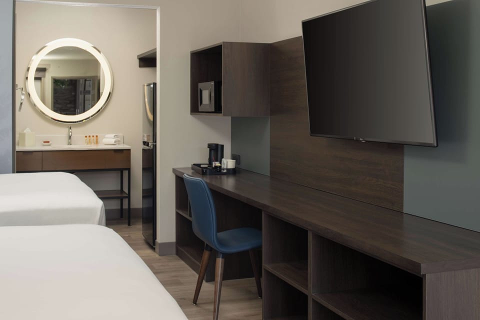 Catch up on emails at the desk, then stream and relax.