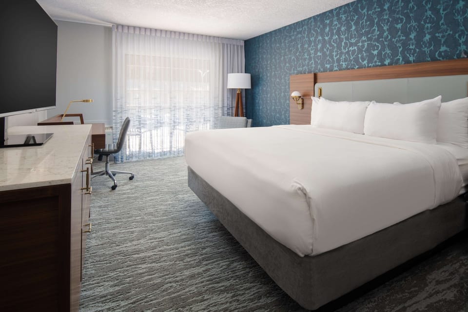 Sink into crisp linens and unwind in a tranquil king bed.