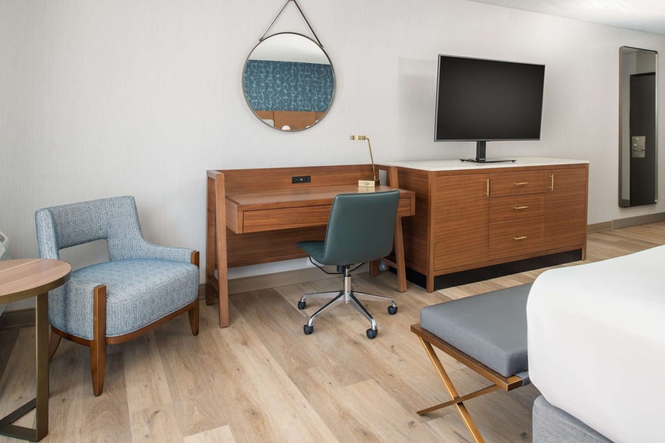 Settle in with a dedicated desk and easy in-room entertainment.