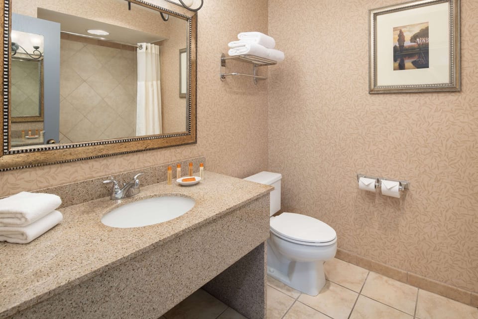 Refresh easily with a spacious vanity and bright mirror lighting.