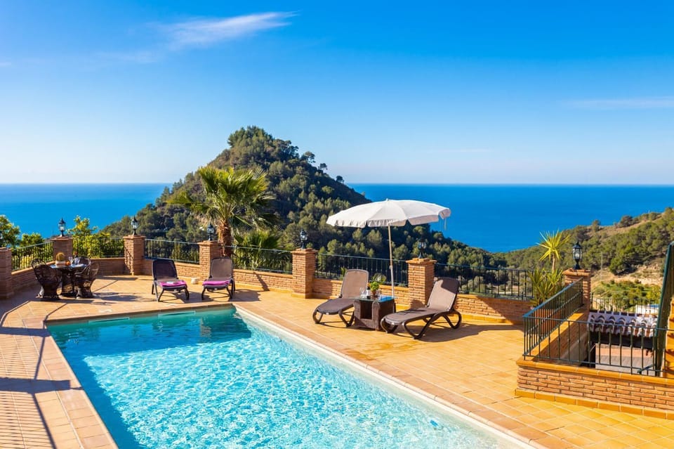 Private pool and terrace with panoramic sea views