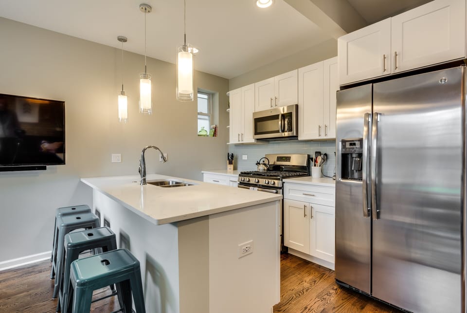 Bar seating for four at the kitchen counter