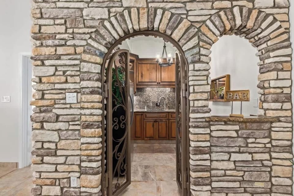 Private wet bar with custom stone