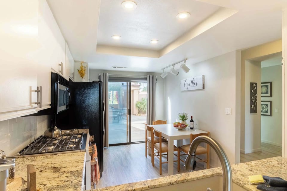 The kitchen also has a smaller table to use for food preparation or perfect for breakfast time!