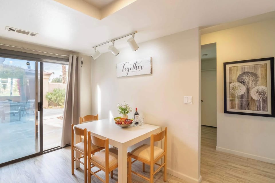 This spacious kitchen looks out to a small porch. A great place to relax.