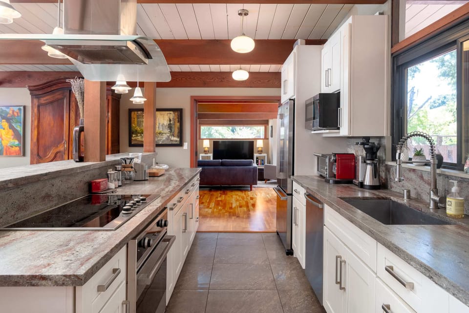 ... which has granite countertops and high-end appliances.