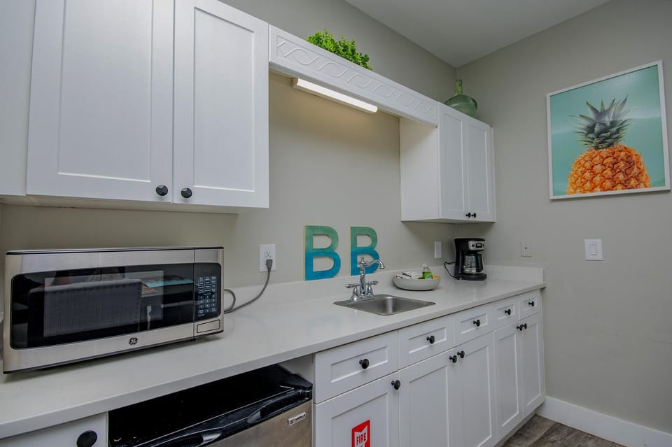 Bright, modern kitchen with ample storage and countertop space