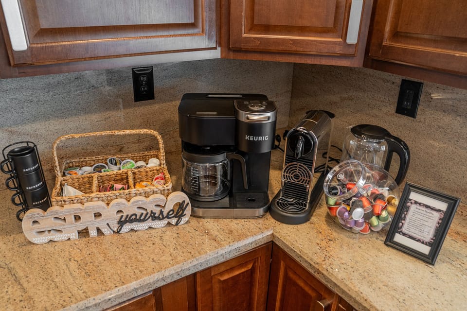 Tea, coffee, espresso, creamer, and sugar provided.