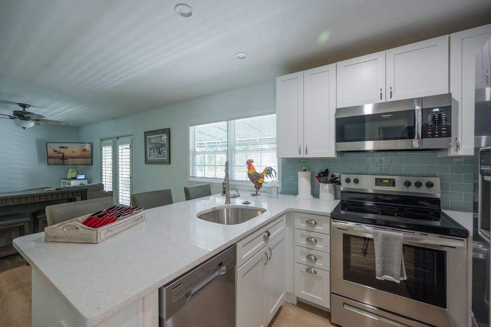 Kitchen with all stainless steel appliances.
