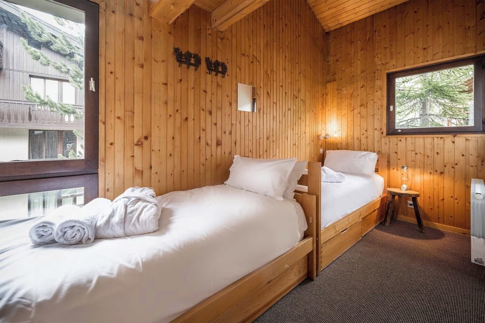 Relax on the comfy bed after a day outside.