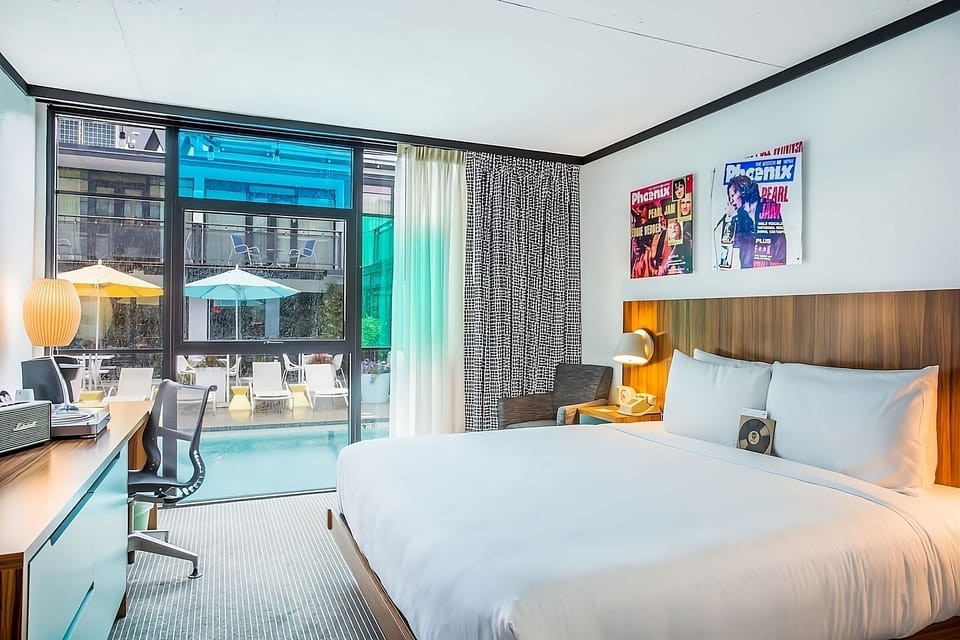 Wake up to poolside views from your plush king bed.
