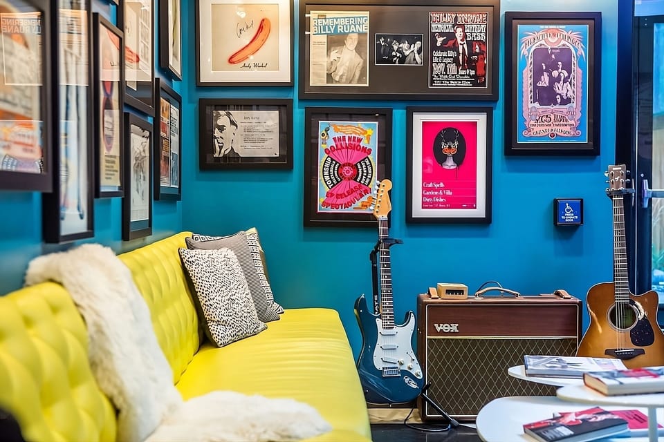 Lounge by the guitars and art for a playful vibe.