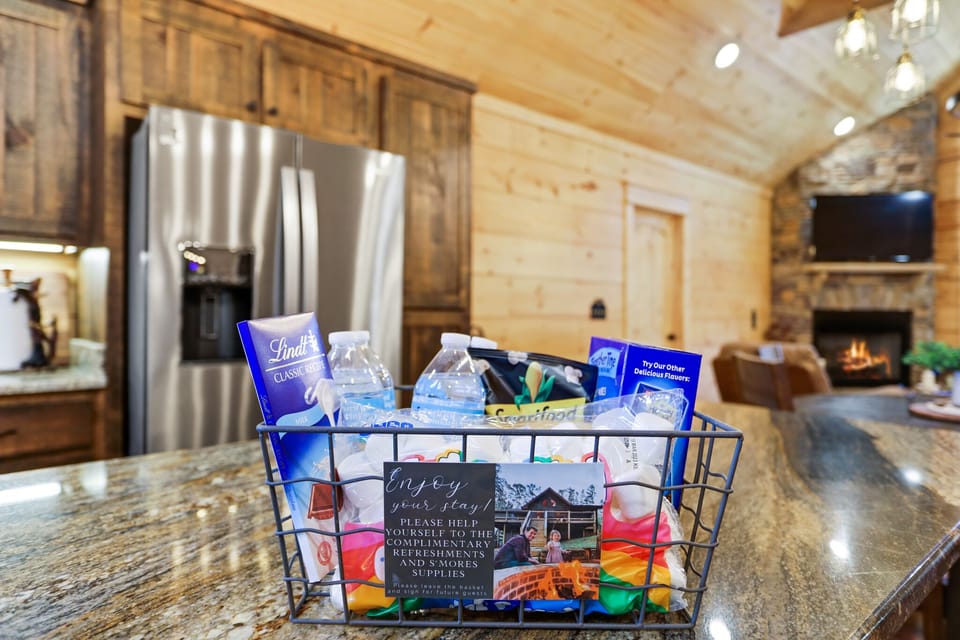 Complimentary welcome basket with snacks, water, and s’mores supplies.
