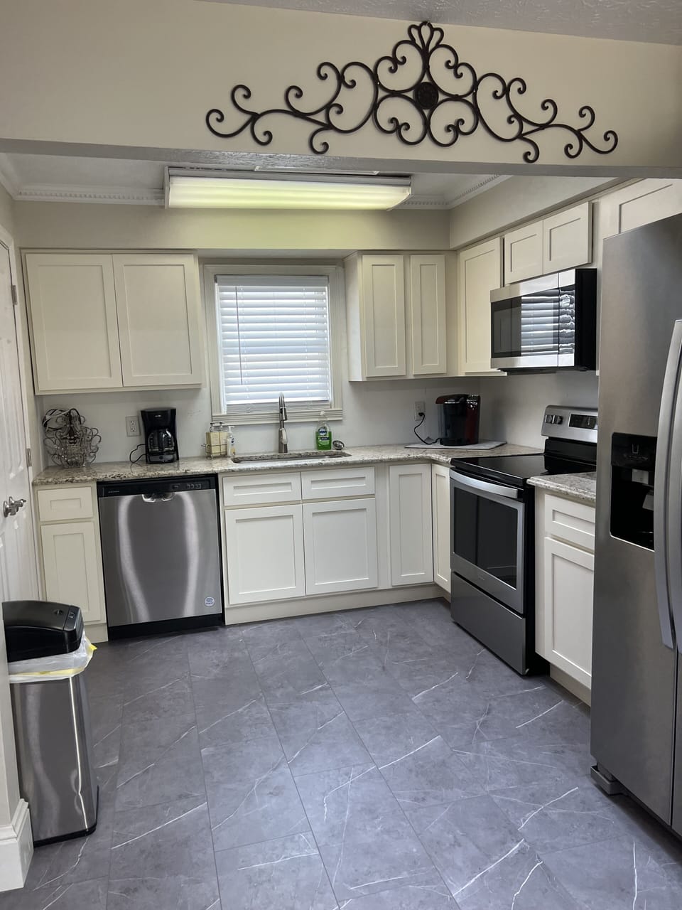 Kitchen with granite countertops.