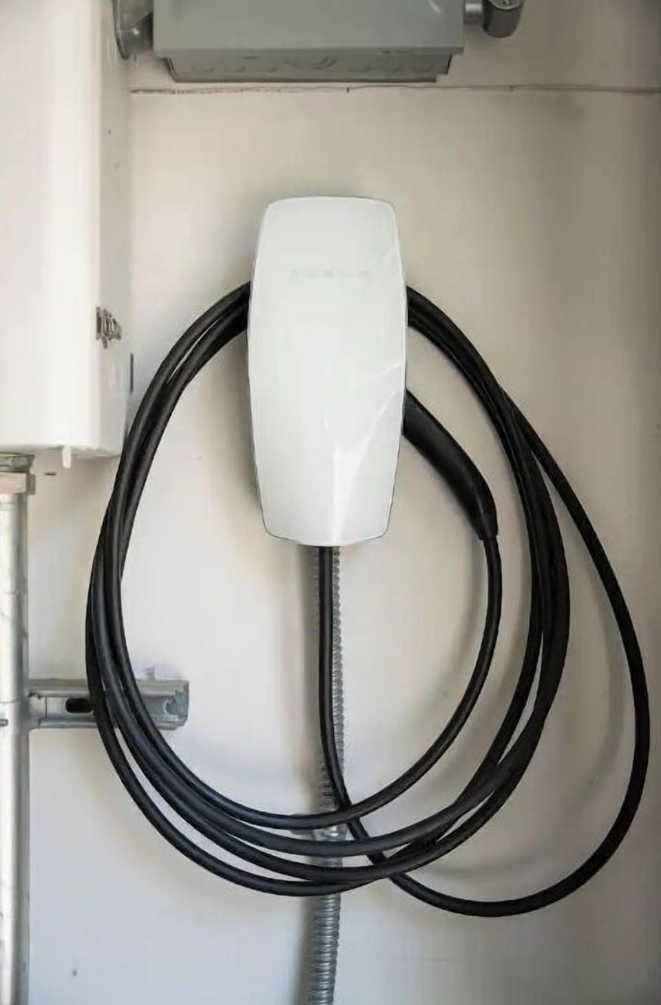 Tesla charger in the 2 car garage 