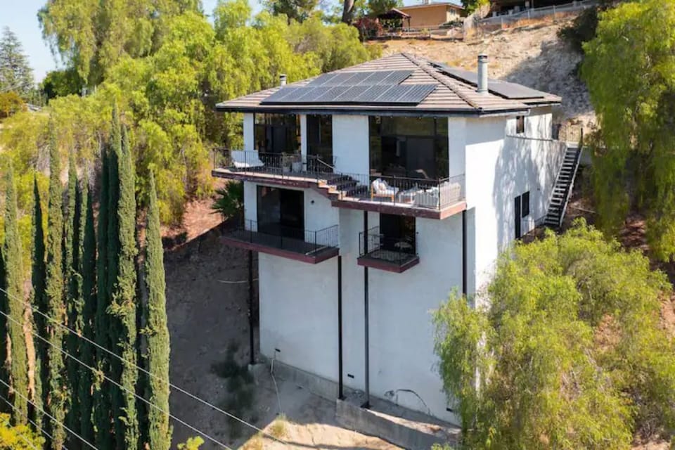 Aerial shot of the back of the home. Fully run on solar with backup battery 