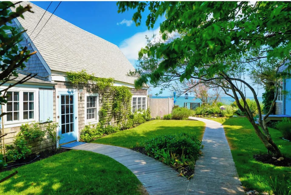 Entry to cottage (Left) and studio (Right) and seaside gardens 