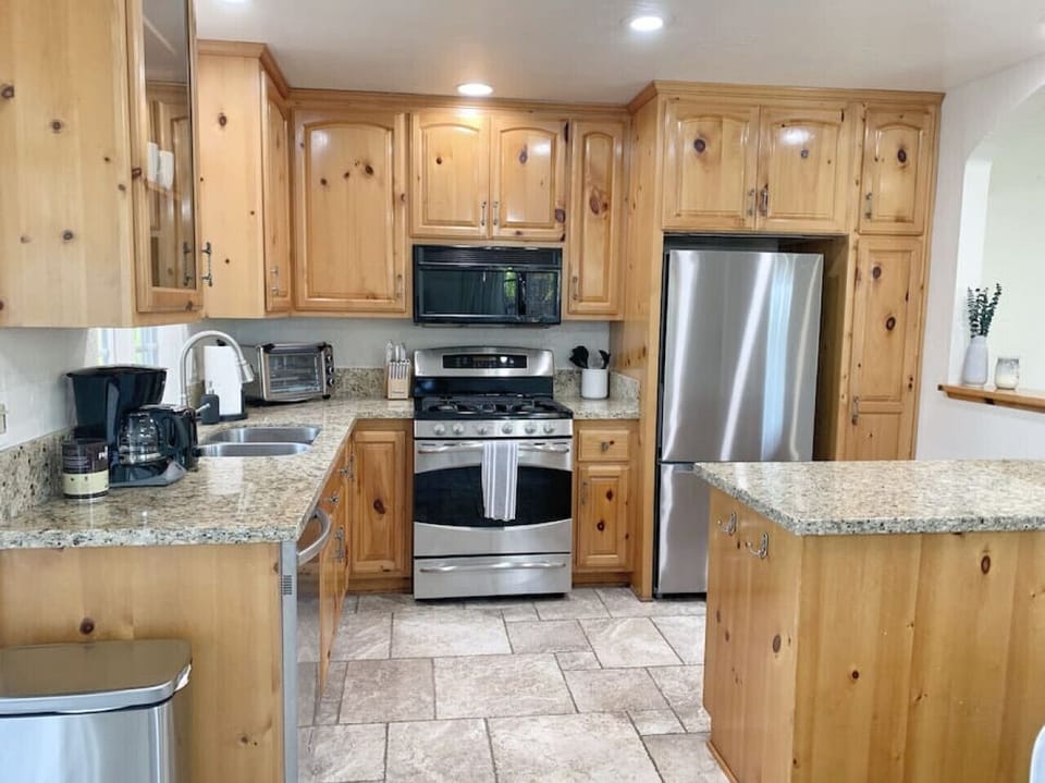 Kitchen with lots of appliances to use.