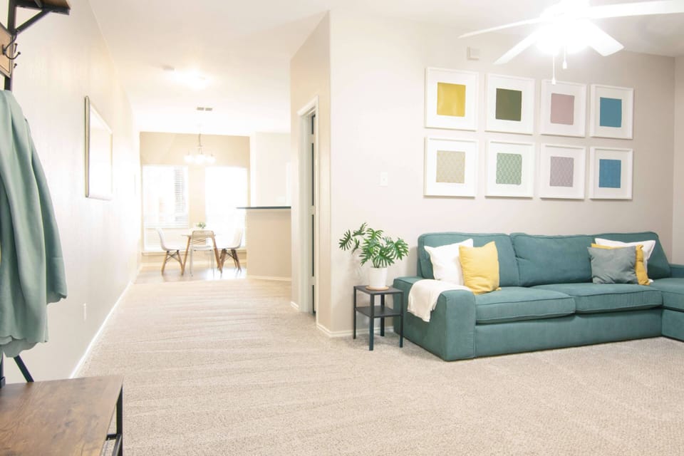Entryway, living room,  hallway to kitchen.