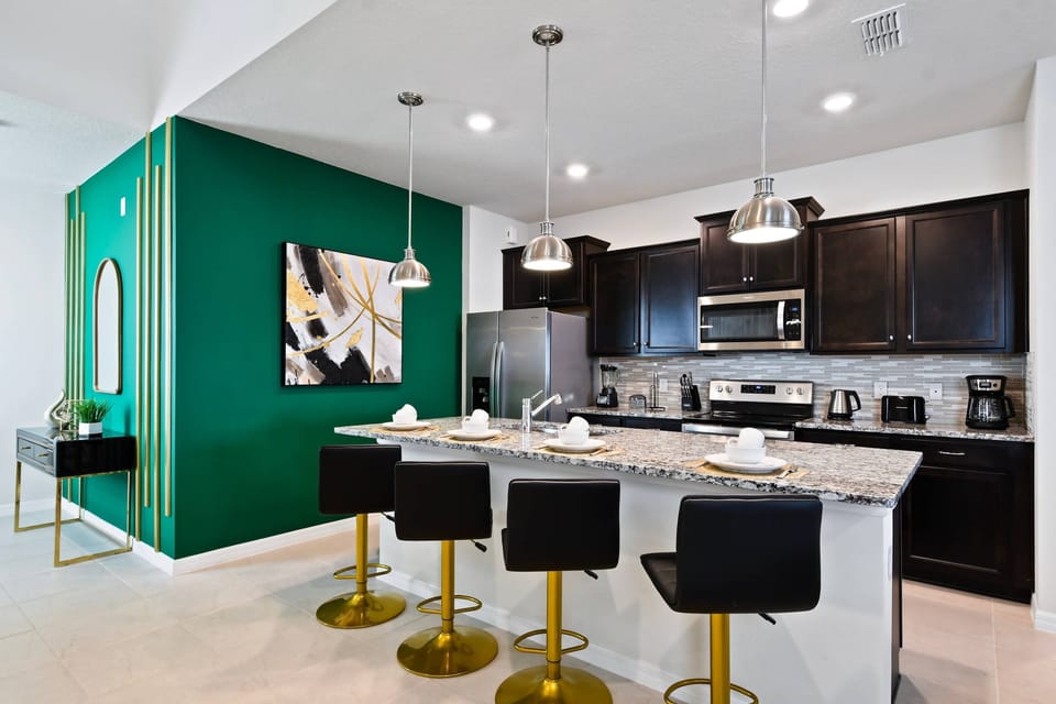 Sit up at the breakfast bar and keep the chef company.