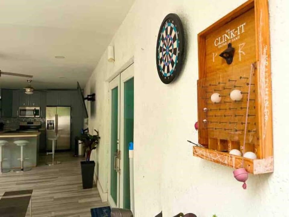 Enjoy the living room with your family and friends and a dartboard shot