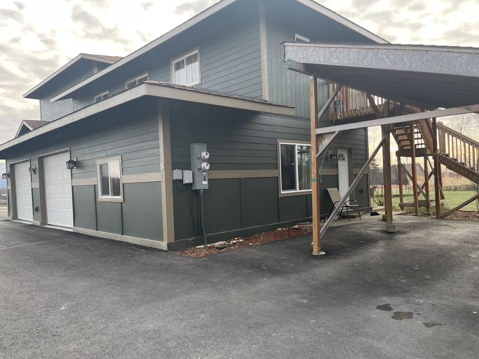 Carport next to apartment door