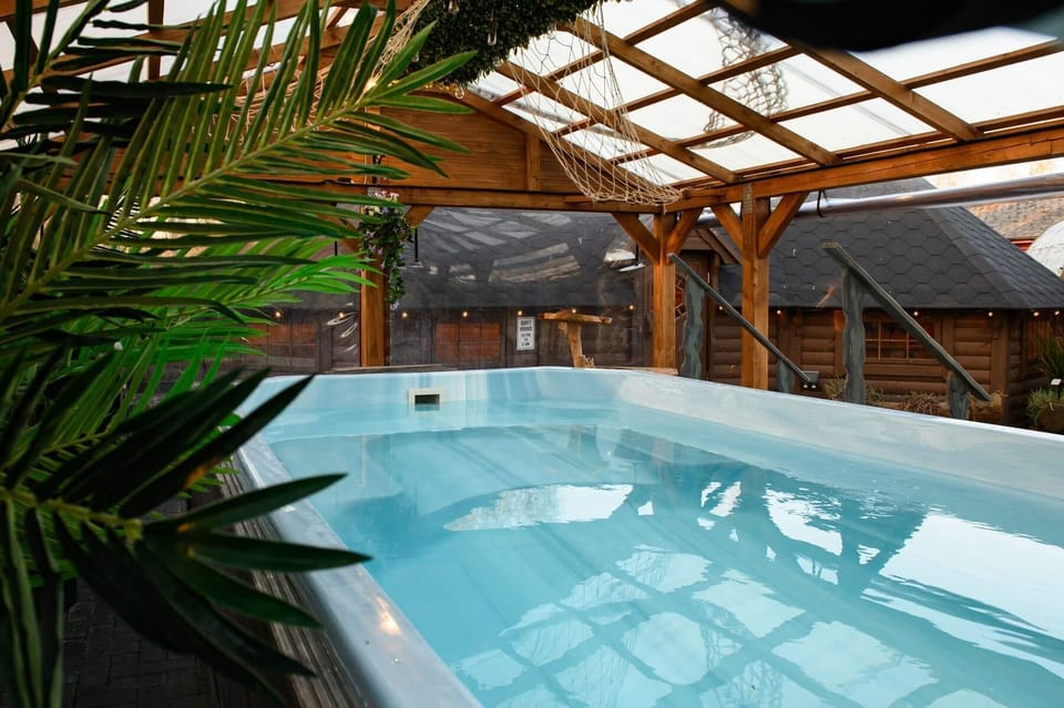 Escape the everyday hustle and indulge in pure relaxation with the eccentric facilities at Rokis Holiday Home. Take a refreshing dip in the heated pool regardless of the weather, or simply soak up the sun on comfortable loungers by pool.