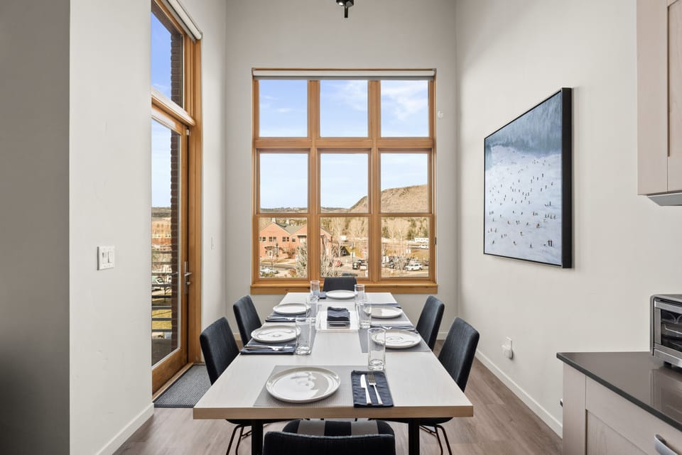 Dining area - six comfortably.  The door on left goes out to the patio.
