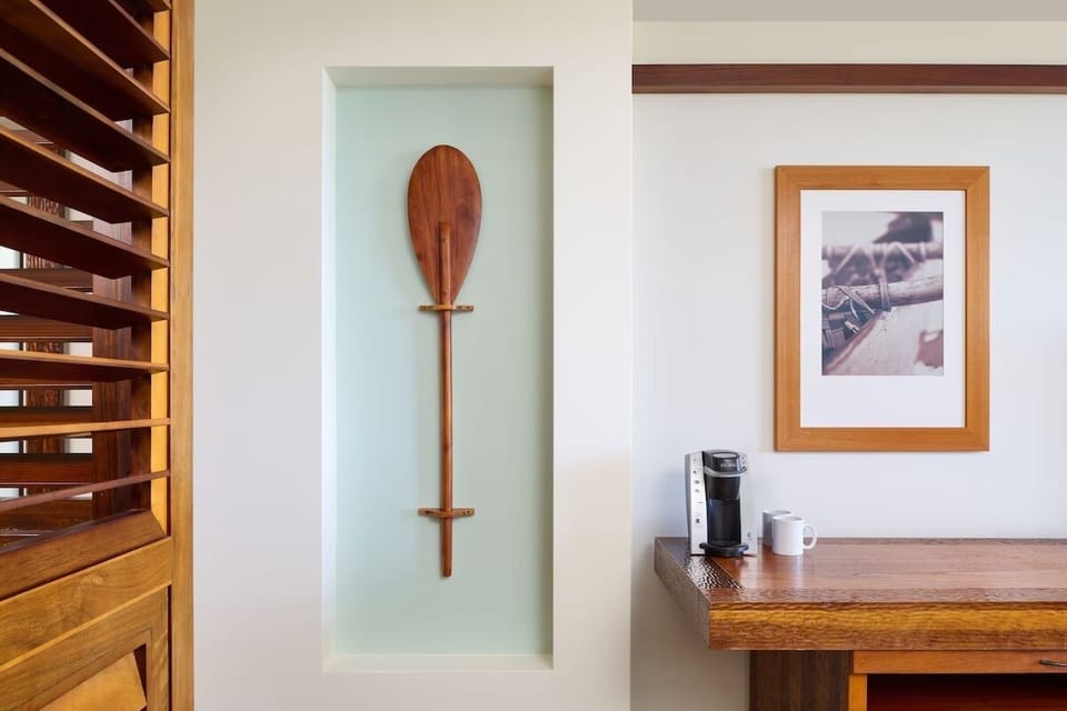 Start slow mornings with in-room coffee and island-inspired details.