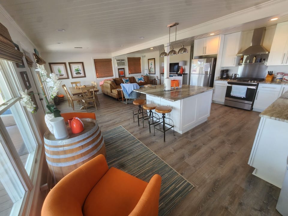 Open concept living area and eat in kitchen.