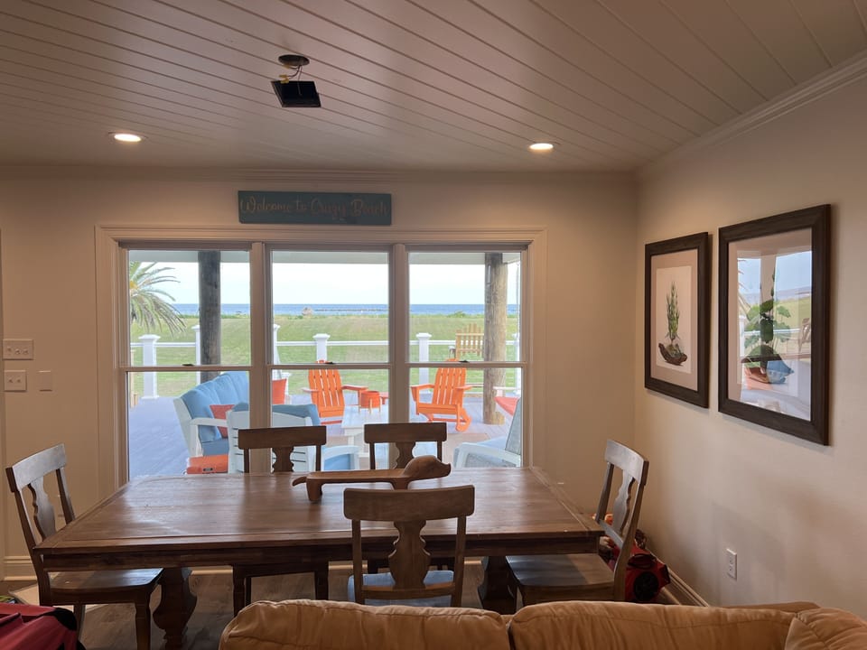 Great view of back deck and beach.