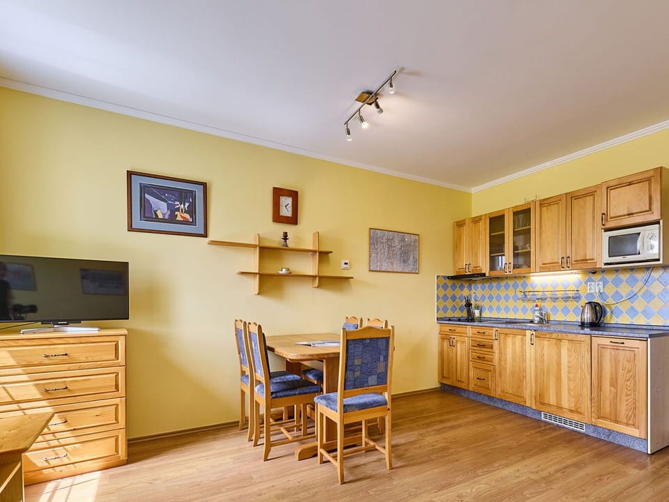 Property, Cabinetry, Furniture, Table, Picture Frame, Wood, Countertop, Interior Design, Chair, Drawer