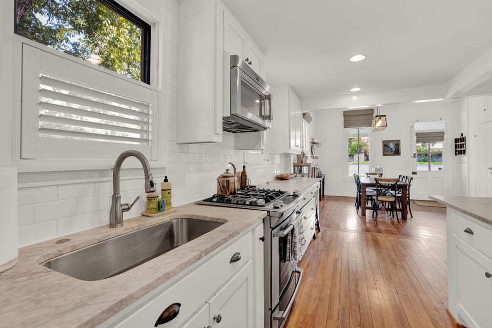 Kitchen has everything you need for meals or just coffee and wine