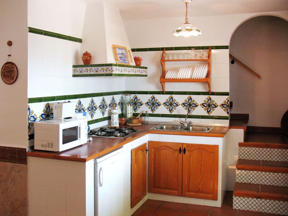 Cabinetry, Countertop, Property, Furniture, Kitchen, Lighting, Interior Design, Wood, Kitchen Stove, Home Appliance