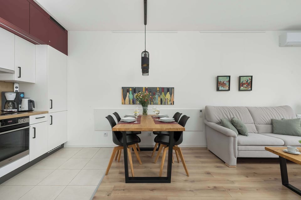 Functional combination of kitchen area and living area.