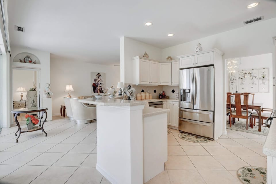 There is An Entrance to and From the Kitchen From the Dining Room