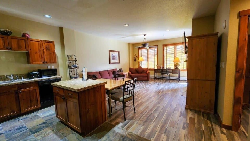 As you enter the condo you are welcomed by the bright intimate space of the open-concept layout of the living, dining, and kitchen area making it a great area for a small group to stay connected.