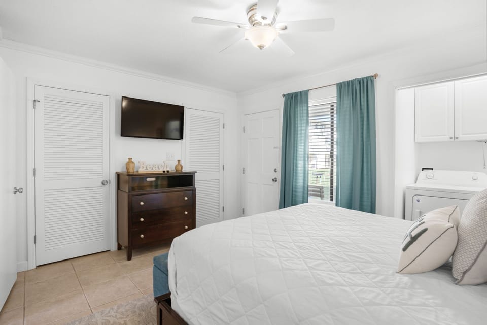 Master bedroom with flat screen TV