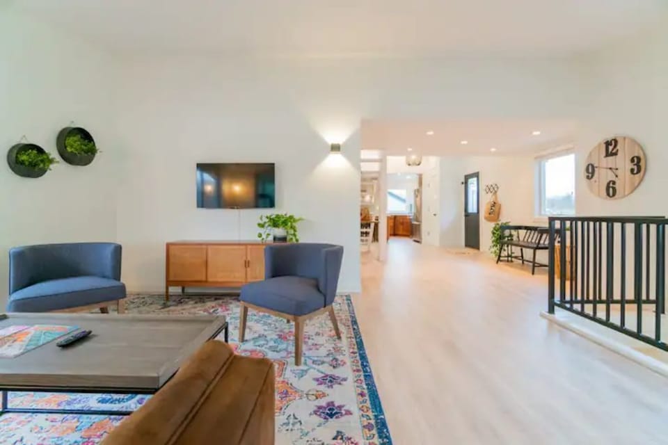 View from living area to entryway and kitchen