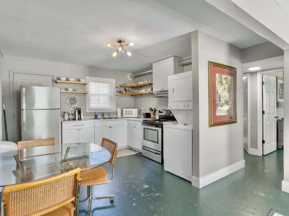 The kitchen is stocked with all the essentials, including complimentary coffee.