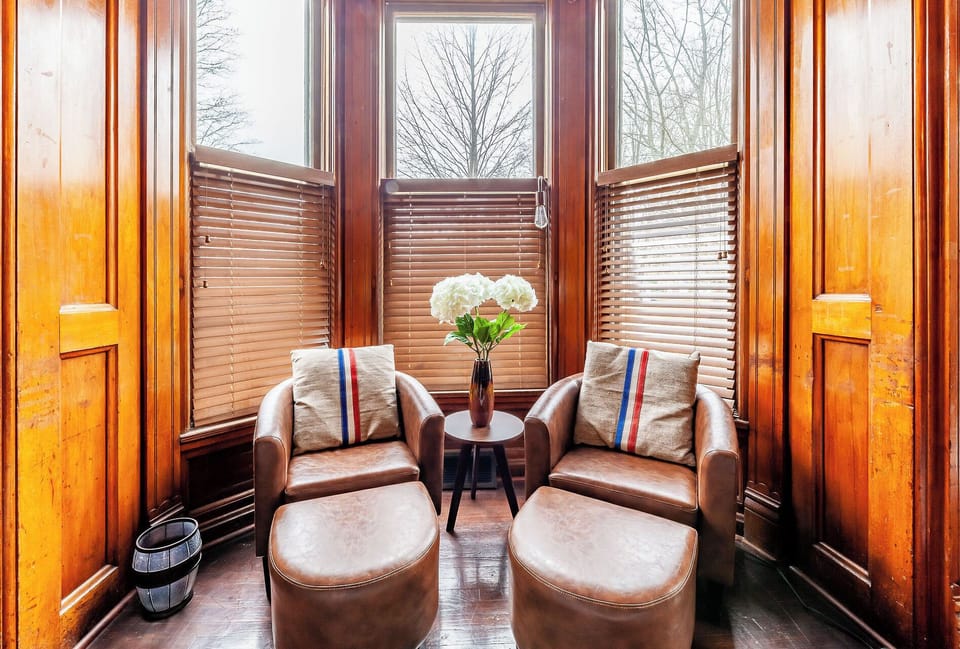 Small sitting nook behind dining table