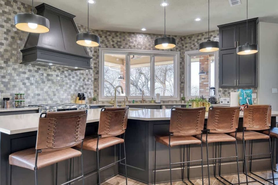 Large kitchen with expansive kitchen island with seating for 6