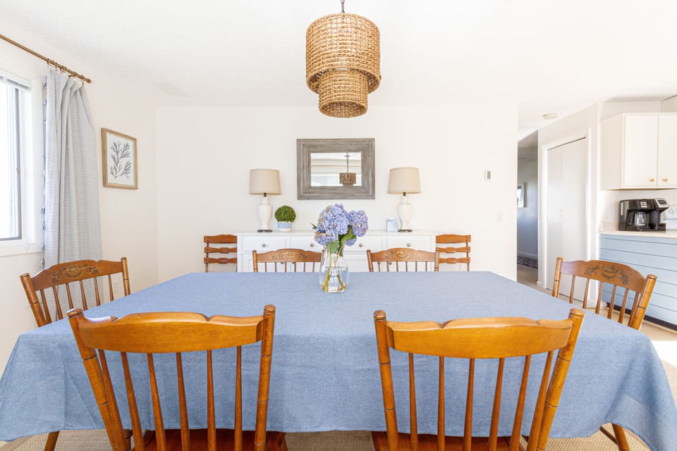 Dining room table extends to seat 8. 