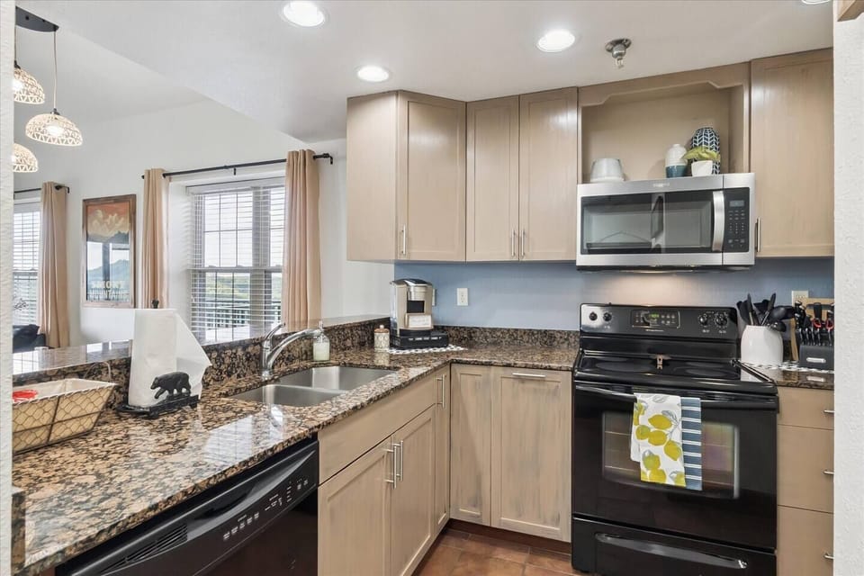 Prepare delicious meals in our fully equipped kitchen with modern appliances.