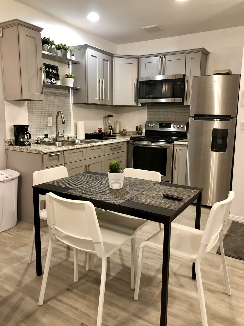 Full kitchen with cooking utenciles